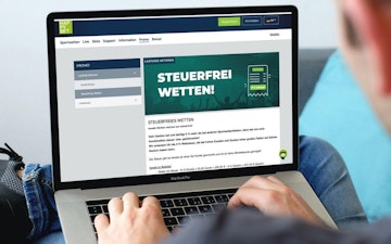 HAPPYBET steuerfreies Wetten Banner auf dem Laptop